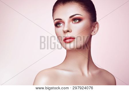 Beautiful Young Woman With Clean Fresh Skin. Perfect Makeup. Beauty Fashion. Eyelashes. Cosmetic Eye