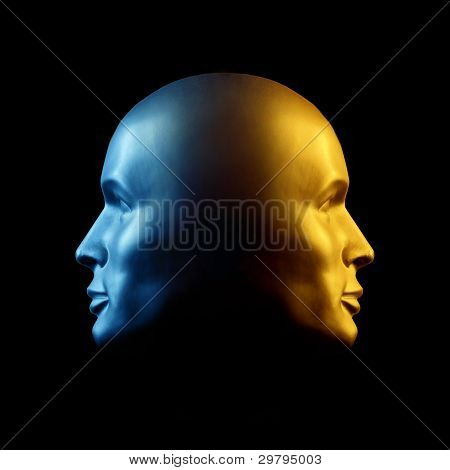 รูปปั้นหัว two-faced สีน้ำเงิน และทอง