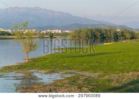 Scenic Valley Landscape With Shkodra City Background. Albania, Europe