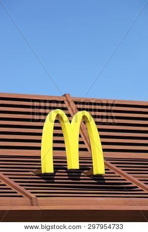 Vejle, Denmark - April 21, 2018: Mc Donalds Logo On A Facade. Mcdonalds Is The Worlds Largest Chain 