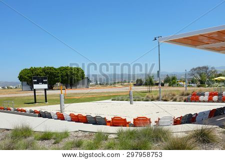 IRVINE, CALIFORNIA - APRIL 25, 2019: Championship Sand Volleyball Court at the Orange County Great Park. The stadium has seating for 178 spectators.