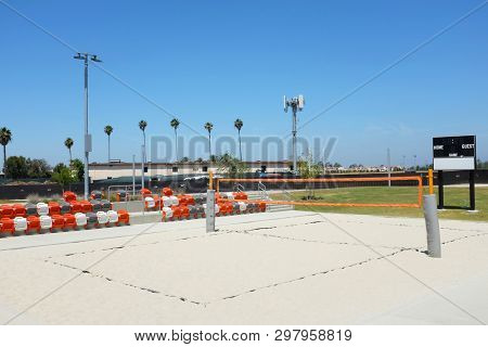 IRVINE, CALIFORNIA - APRIL 25, 2019: Championship Sand Volleyball Court at the Orange County Great Park. The stadium has seating for 178 spectators.