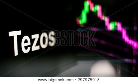 Tezos Cryptocurrency Token. Crisis And The Collapse Of Prices, The Red Graph Down. The Behavior Of T