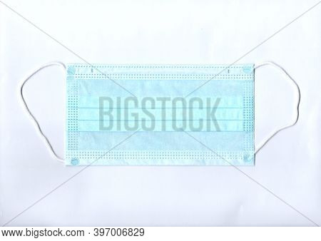 Protective Medical Mask Isolated On White Background. Protection From Covid-19. Non-permanent Mask I