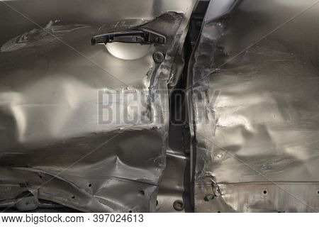 Broken Car Door. Transport After The Collision. Dented Metal Door. Fatal Dent.