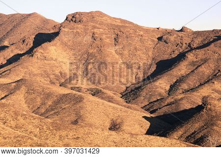 Arid Golden Fields On Barren Hills With Grasslands During Sunset Taken In The Rural Southern Califor