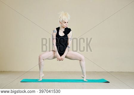 Attractive Stylish Female Dance With Strong Beautiful Legs Doing Plie Squat