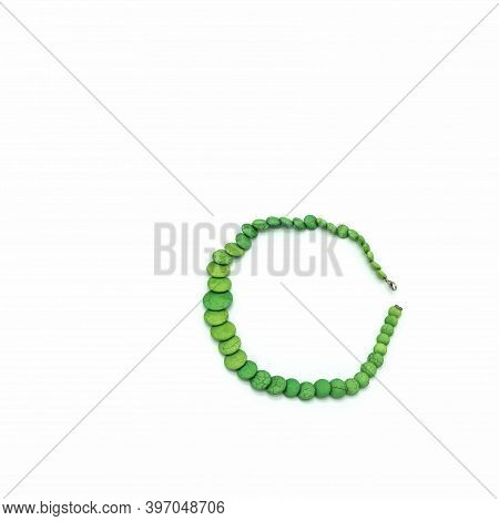 Women's Necklace Made Of Green Flat Round Beads. Color With Veins Imitating Natural Stone. Metal Cla