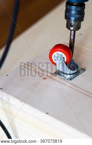 Fixing Castor Wheel To The Wooden Plywood, Furniture Making.