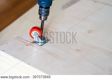 Fixing Castor Wheel To The Wooden Plywood, Furniture Making.