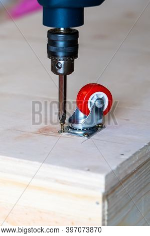 Fixing Castor Wheel To The Wooden Plywood, Furniture Making.