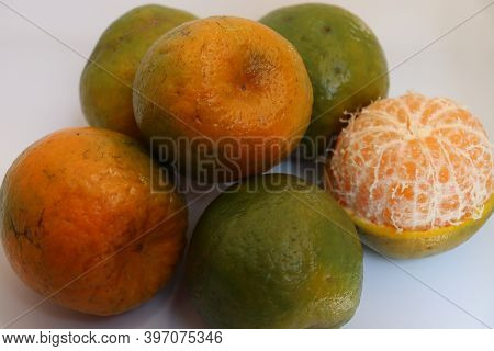 Green And Yellow Colored Orange Stock