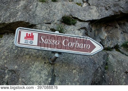 Bellinzona, Ticino, Switzerland - 31st October 2020 : View Of The Sasso Corbaro Castle Sign On A Roc