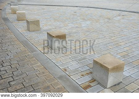 Blocking Of Traffic Against Car Entry Or Traffic Control Retracting Pillars Stone Blocks On The Road