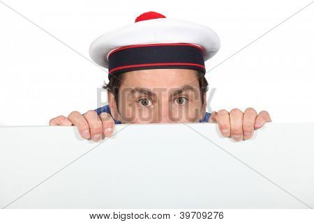 Man in a silly sailor's hat