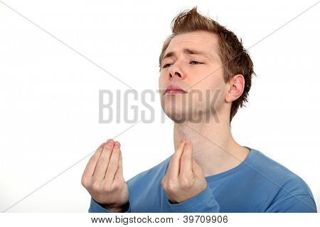 Young man imploring
