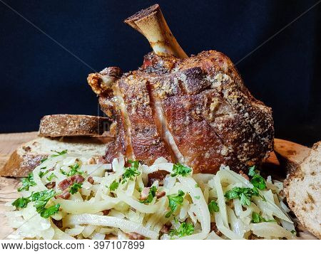 Pork Knuckle With White Cabbage And Bread