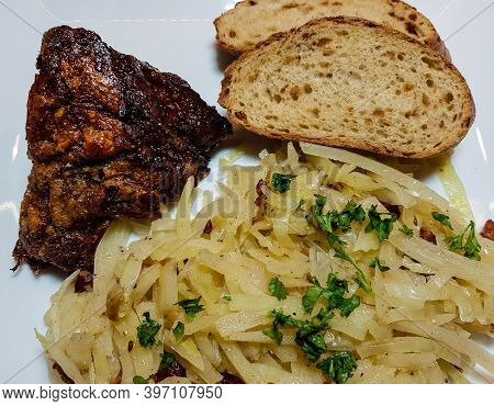 Pork Knuckle With White Cabbage And Bread
