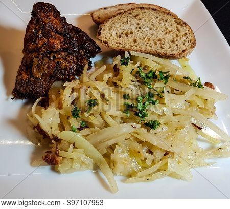 Pork Knuckle With White Cabbage And Bread