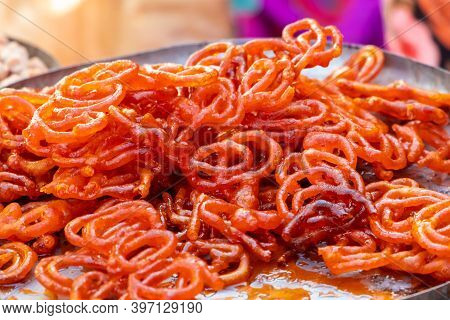 Fresh Jalebi Sweet Snack Outdoors In A Bazaar.