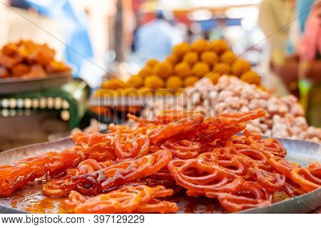 Fresh Jalebi Sweet Snack Outdoors In A Bazaar.