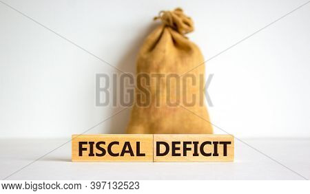 Fiscal Deficit. Concept Words 'fiscal Deficit' On Blocks On A Beautiful White Background. Large Canv