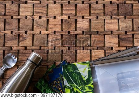 Environmentally Safe Eco-friendly Kitchen Products On Wooden Background: Stainless Steel Refill Bott