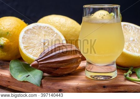 Ice Cold Sweet Limoncello Liqueur Made From New Harvest Of Fresh Ripe Yellow Italian Lemons, Amalfi
