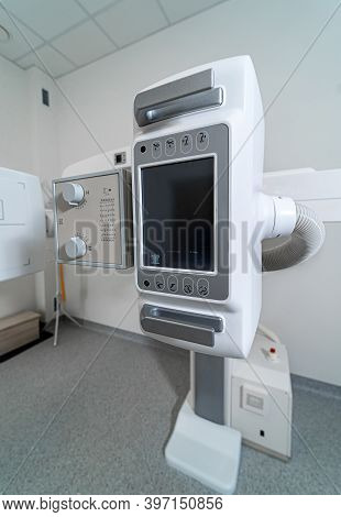 Remote Controlled X-ray Machine In Modern Clinic. Radiographic And Fluoroscopic Diagnostic System Wi