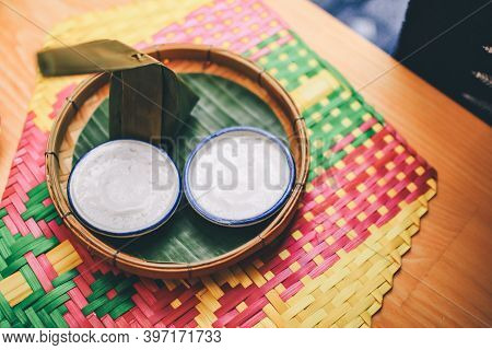 Thai Dessert Coconut Milk Pudding In Small Porcelain Cup Or Khanom Thuai And Steamed Coconut Custard