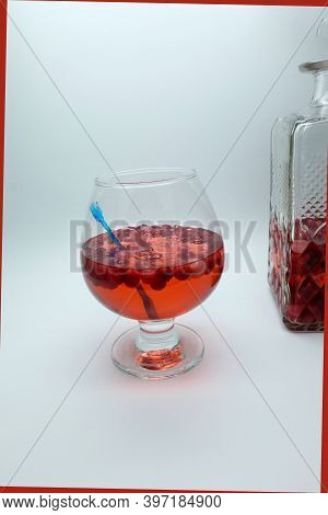 Homemade Tincture Of Red Cherry. Berry Alcoholic Drinks Concept. Homemade Red Wine Made From Ripe Ch