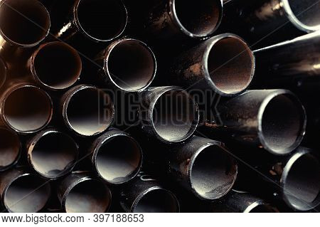 Black Metal Pipes And Adapters Of Different Diameters For Gasification Or Water Supply. Industrial B