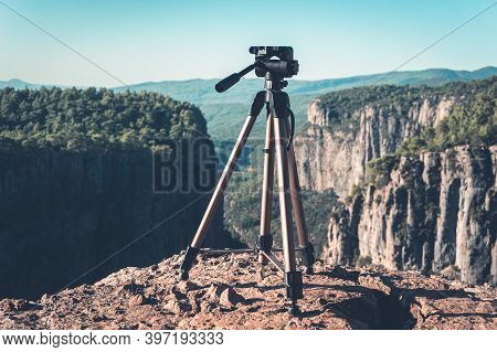 Professional Tripod Isolated On Nature Landscape Background. Tazi Canyon (greyhound Valley), Manavga