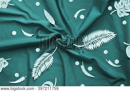 Tidewater Green Color. Creative Trendy Flat Lay With Exotic Paper Leaves, Monstera And Fern On Texti