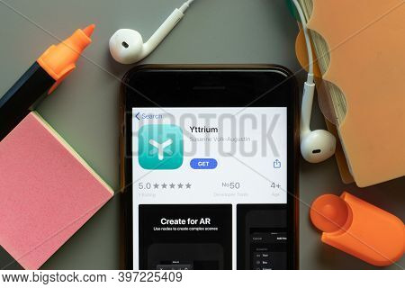 New York, Usa - 1 December 2020: Yttrium Mobile App Icon On Phone Screen Top View, Illustrative Edit
