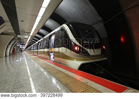 Motin Blured Metro Moving In A Station