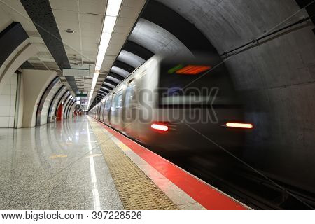 Motin Blured Metro Moving In A Station