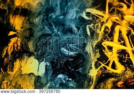Black And Yellow Pigments Difusion Into Each Other Abstract Colorful Vivid Background