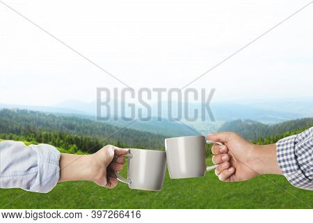 Closeness To Nature. Couple With Cups In Mountains, Closeup