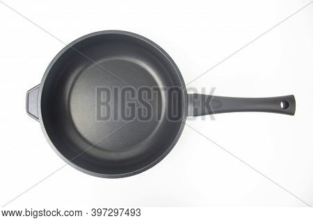 Biack Frying Pan With Non-stick Teflon Coating On White Background