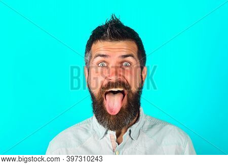 Bearded Man Shows Tongue. People Emotions. Face Expression. Fanny Man. Happy Man. Bearded Man With L