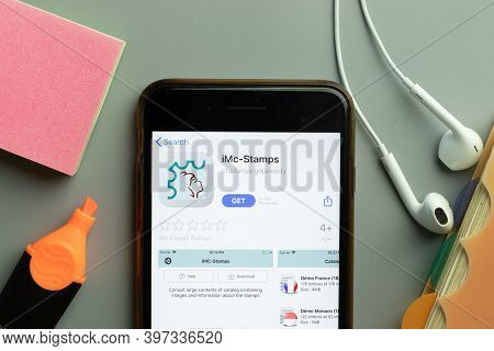 New York, Usa - 1 December 2020: Imc-stamps Mobile App Icon On Phone Screen Top View, Illustrative E