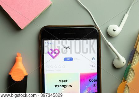 New York, Usa - 1 December 2020: Hotu Mobile App Icon On Phone Screen Top View, Illustrative Editori
