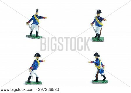 4 In 1 Image Of Handmade Tin Soldiers With Sword On The White Background