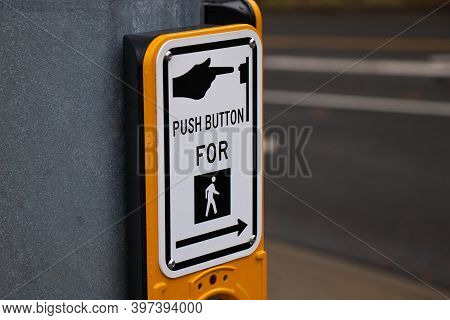 Traffic Light Button On Pedestrian Crosswalk In Canada. People Have To Push And Wait To Start Cross