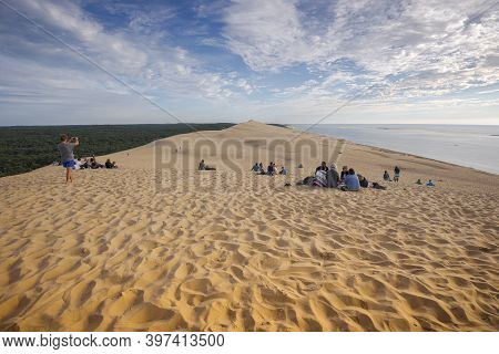 La Teste-de-buch, France - August 12, 2017: Tourists On The Top Of The Dune Of Pilat, The Tallest Sa