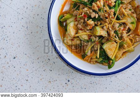 A Picture Of Hot And Spice Red Curry With Minced Pork And Vegetables Such As Small Eggplant, Fingerr