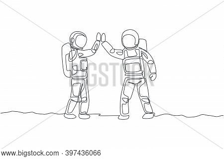 One Single Line Drawing Of Two Young Happy Astronauts Gave High Five While Meeting On The Street In 