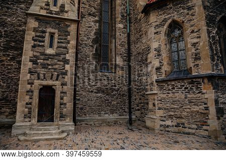 Medieval Stone St. Bartholomew´s Church In Autumn Day, Arched Windows, Chimeras And Gargoyles, Gothi