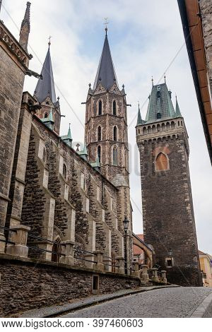 Medieval Stone St. Bartholomew´s Church In Autumn Day, Arched Windows, Chimeras And Gargoyles, Gothi